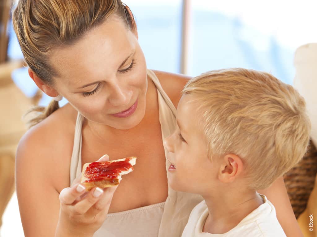 Mom Feeding Boy A Toast