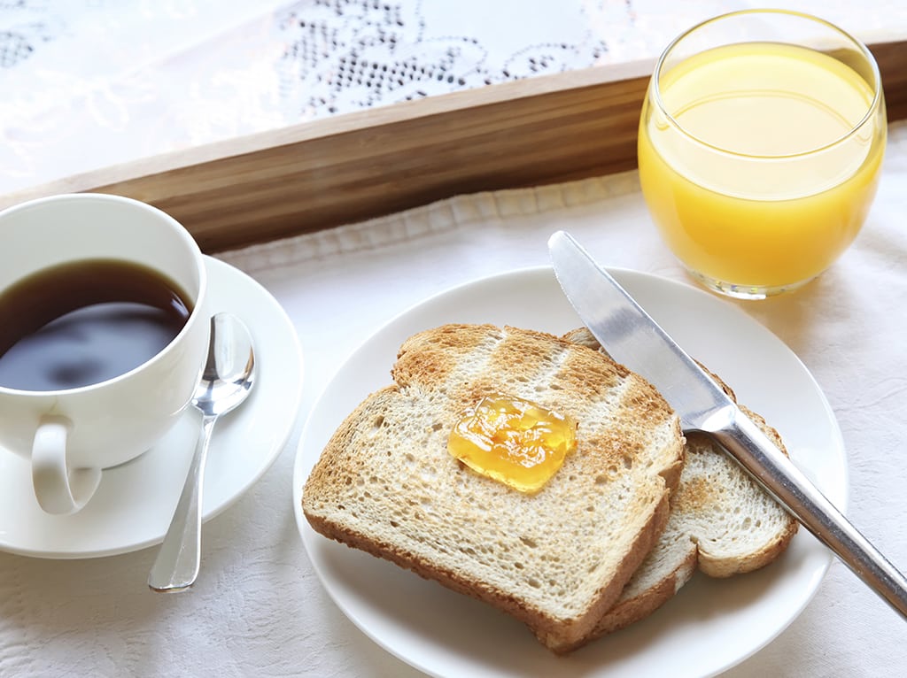 Toasted Bread With Jam And Tea And Juice