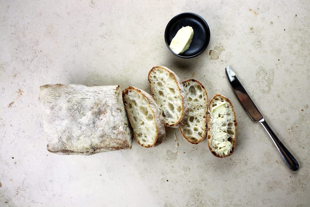 sliced sourdough ciabatta with butter