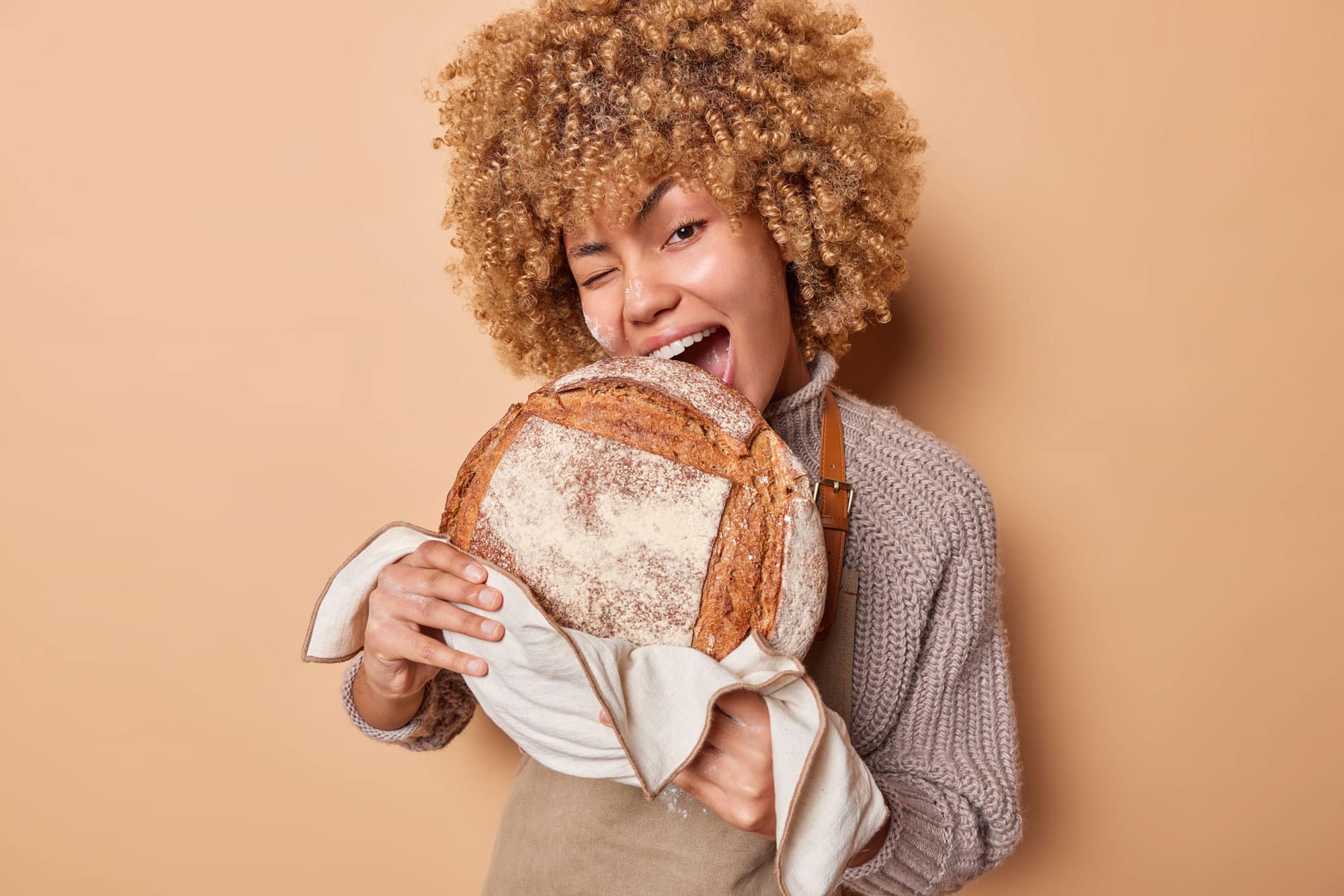 Sourdough-Bread-With-Person-Bite